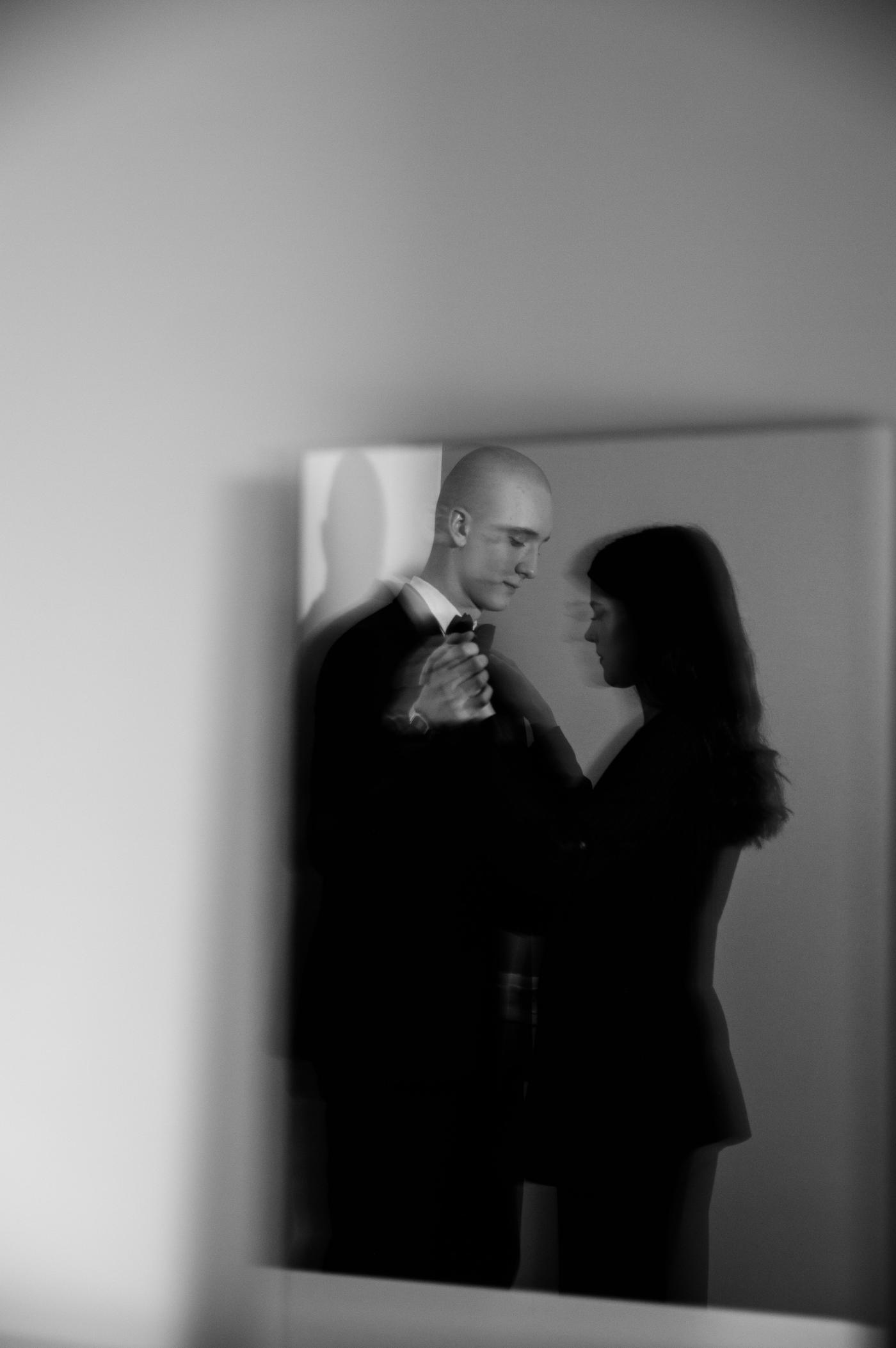 Bride and groom in a quiet embrace